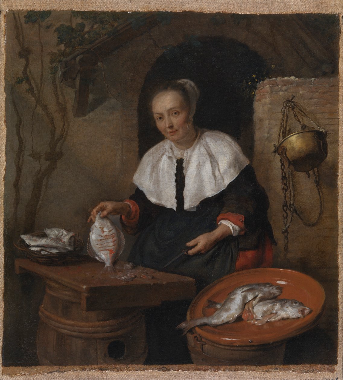 Žena čistící ryby od Gabriel Metsu