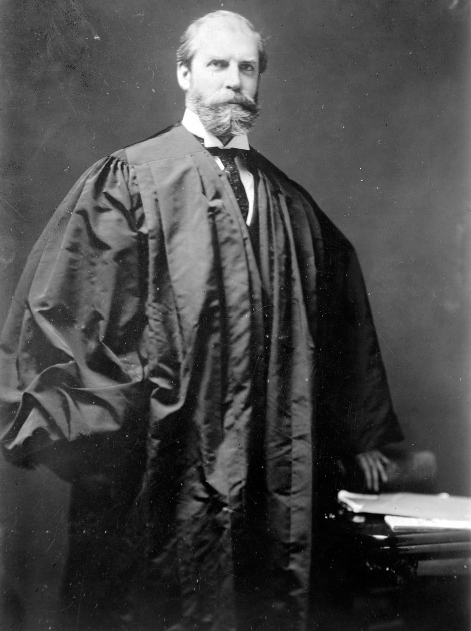 Charles C. Hughes, asi 1915-20 od George Grantham Bain