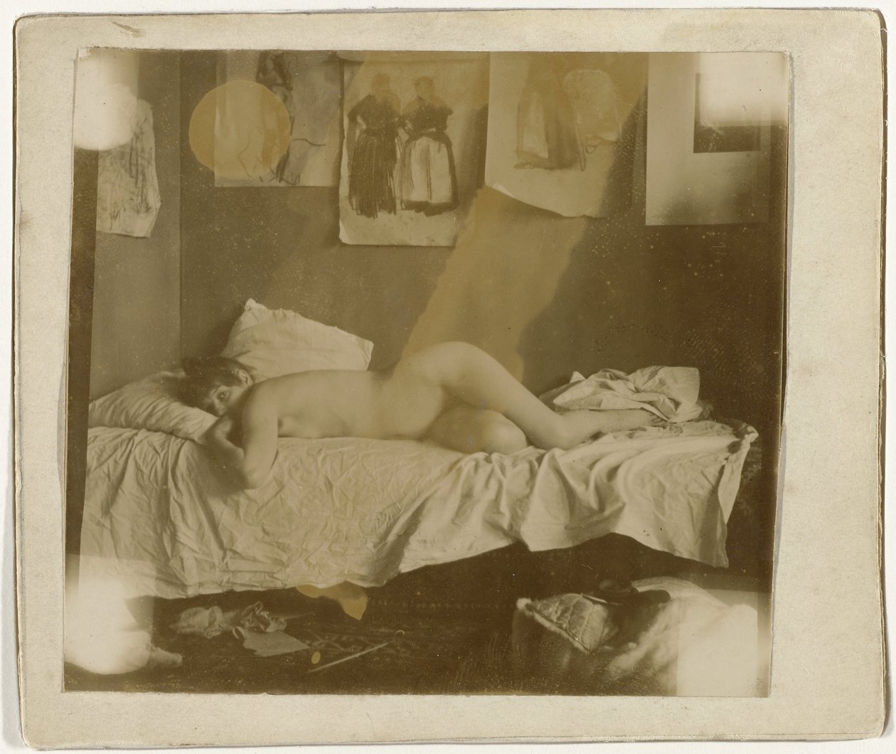 Marie Jordan leží nahá na posteli od George Hendrik Breitner
