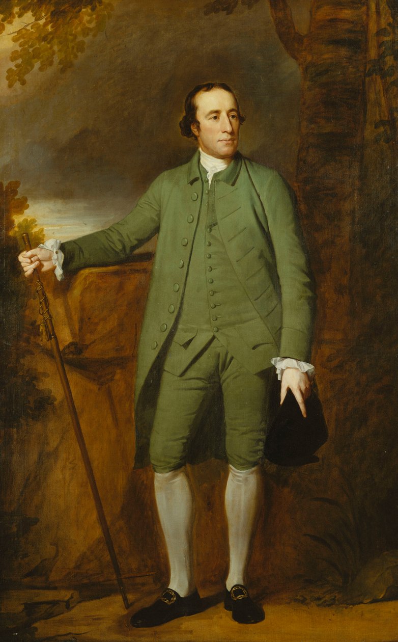Portrét George Morewooda, stojícího po celé délce, v zeleném plášti, vestě a kalhotách, v levé ruce drží klobouk, v pravé hůl, od George Romney