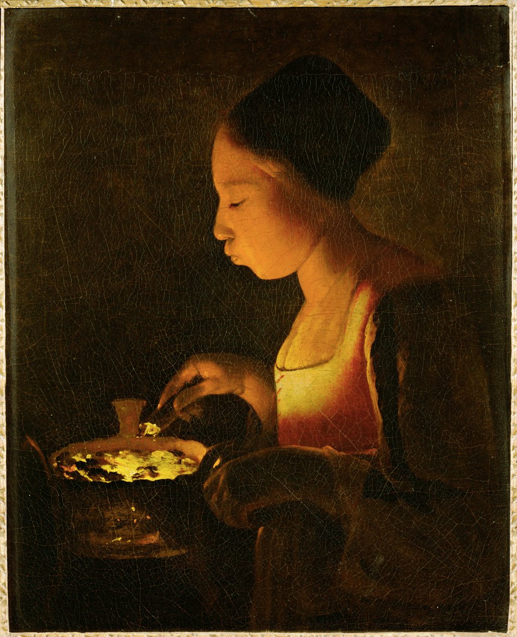 Dívka foukající do louče (malba na plátně) od Georges de la Tour