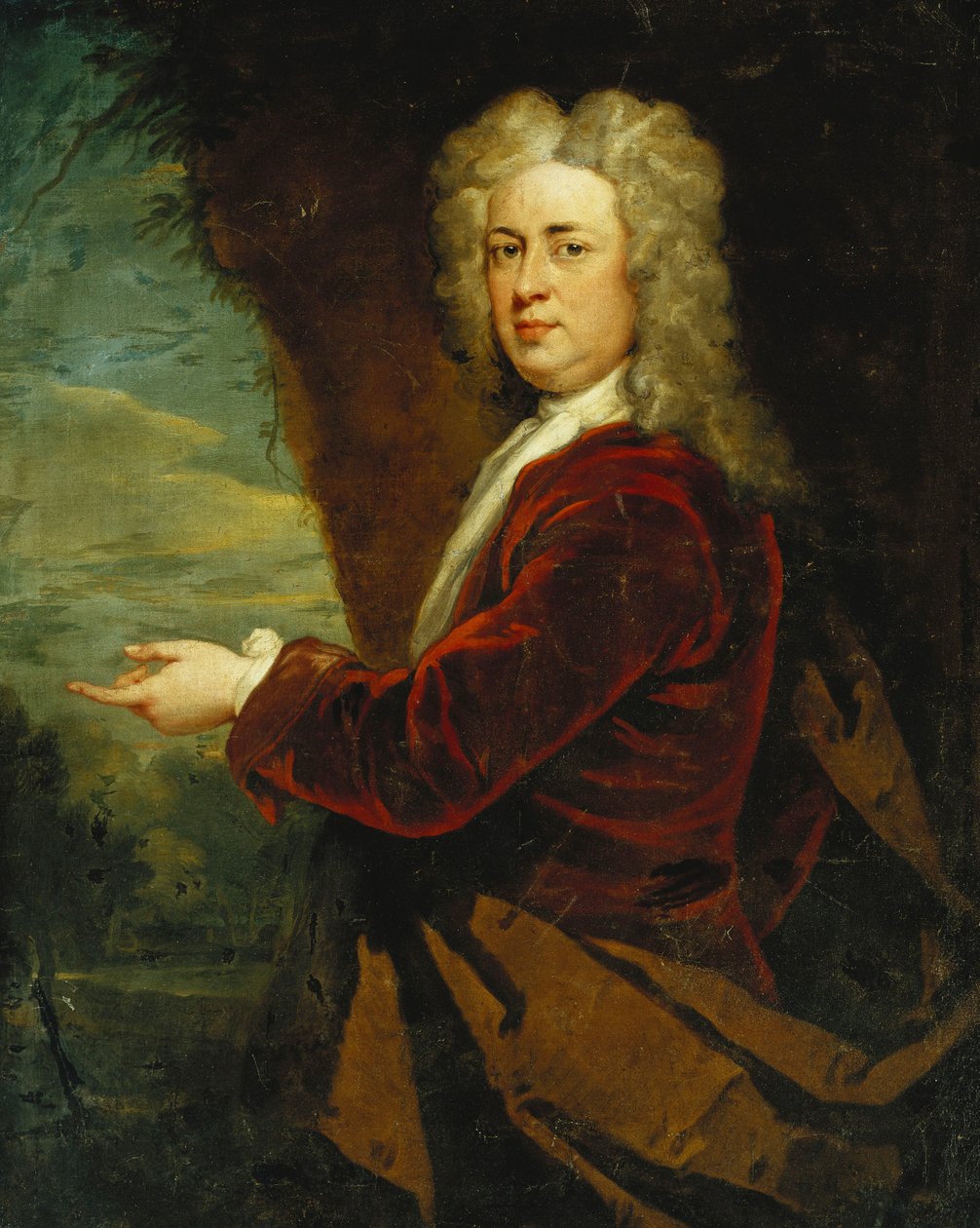 Portrét gentlemana, stojícího poloviční délky, v červeném sametovém saku a hnědém plášti v parku, od Godfrey Kneller