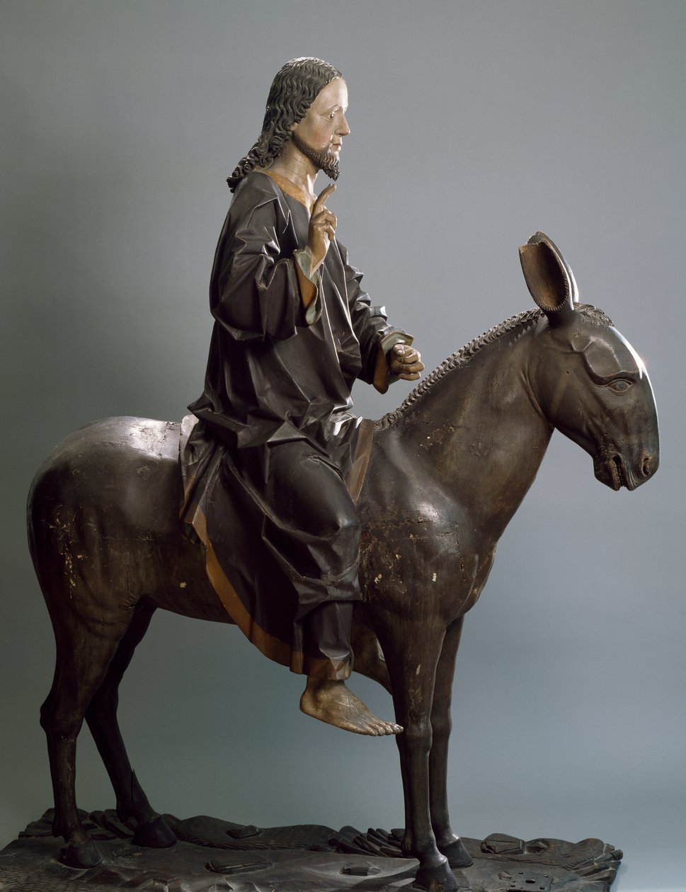 Kristus na oslu, cca 1498, od Hanse Klockera (aktivní cca 1478-1500), polychromovaná dřevěná socha, Itálie od Hans Klocker