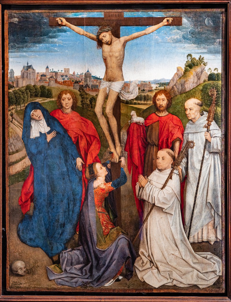 Ukřižovaný Kristus s Pannou Marií, svatým Janem Křtitelem a Evangelistou, Marií Magdalenou a dvěma cisterciáckými opaty. od Hans Memling
