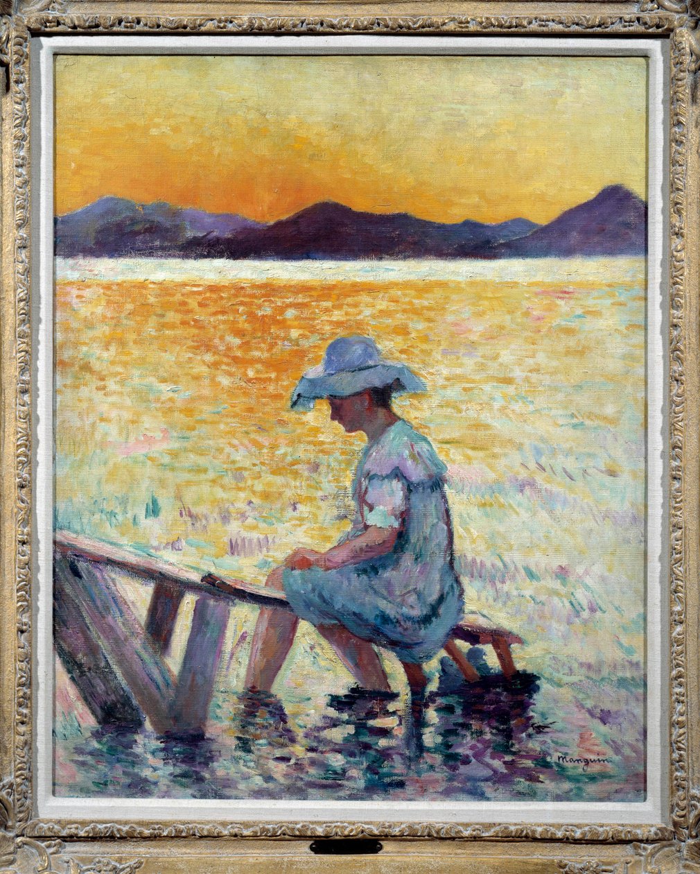 Saint Tropez, západ slunce Žena sedící nohama ve vodě na břehu od Henri Charles Manguin