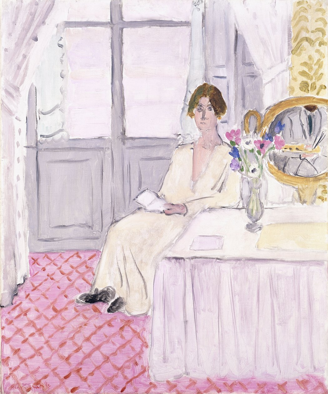 Žena si čte před stolem a kyticí, Nice od Henri Matisse