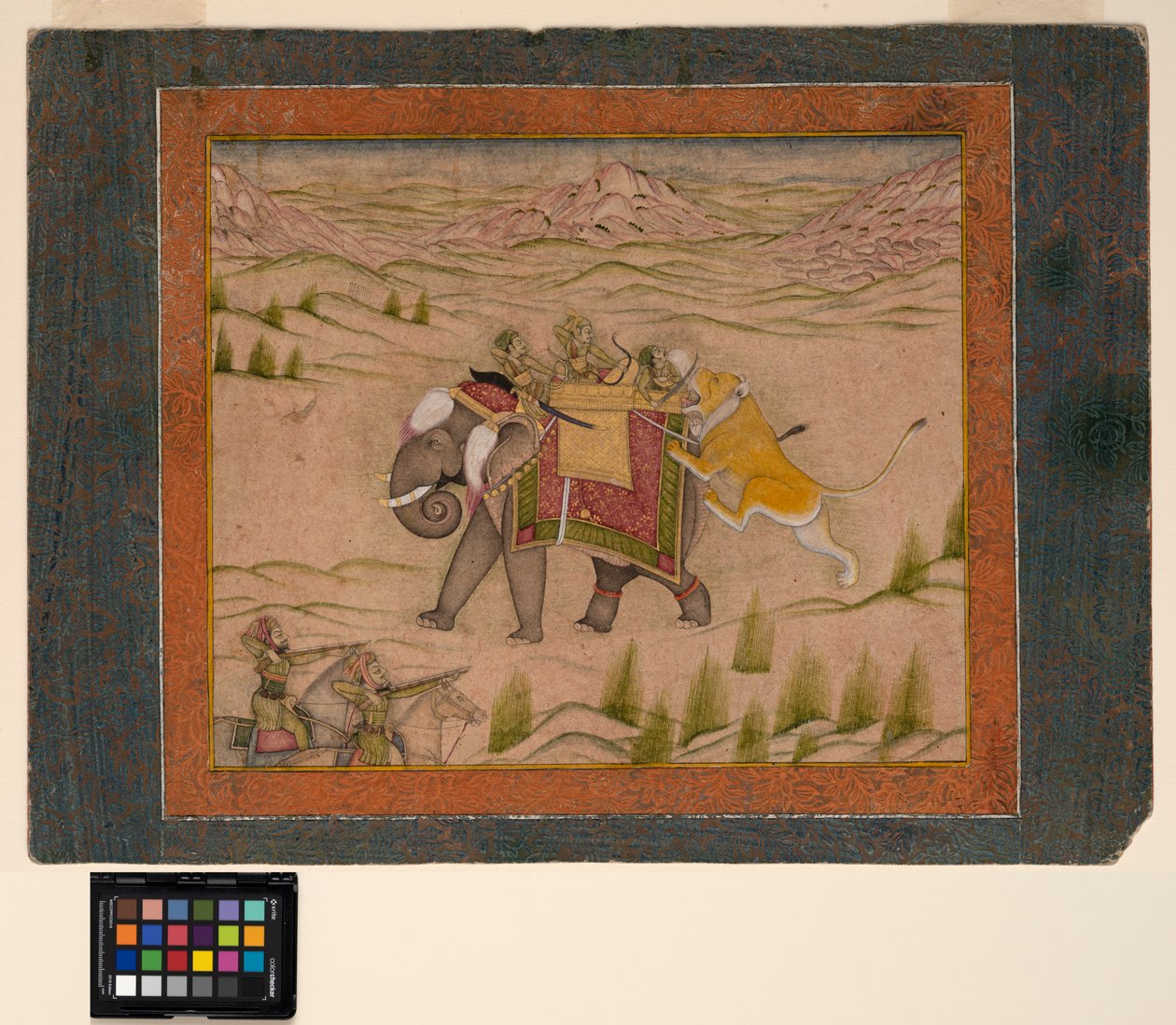 Lev zaútočí na loveckou skupinu na slonovi, kolem roku 1810 (neprůhledný akvarel a zlato na papíře) od Indian School