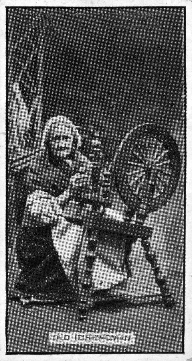 Postarší irská žena u svého kolovratu z fotografie z konce 19. století od Irish Photographer