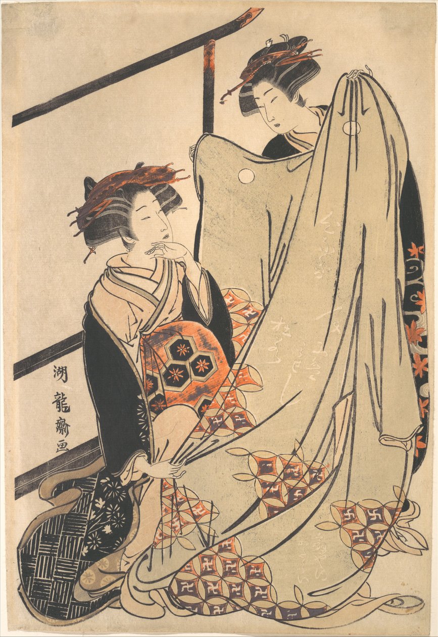 Dvě krásky hledící na kimono od Isoda Koryusai