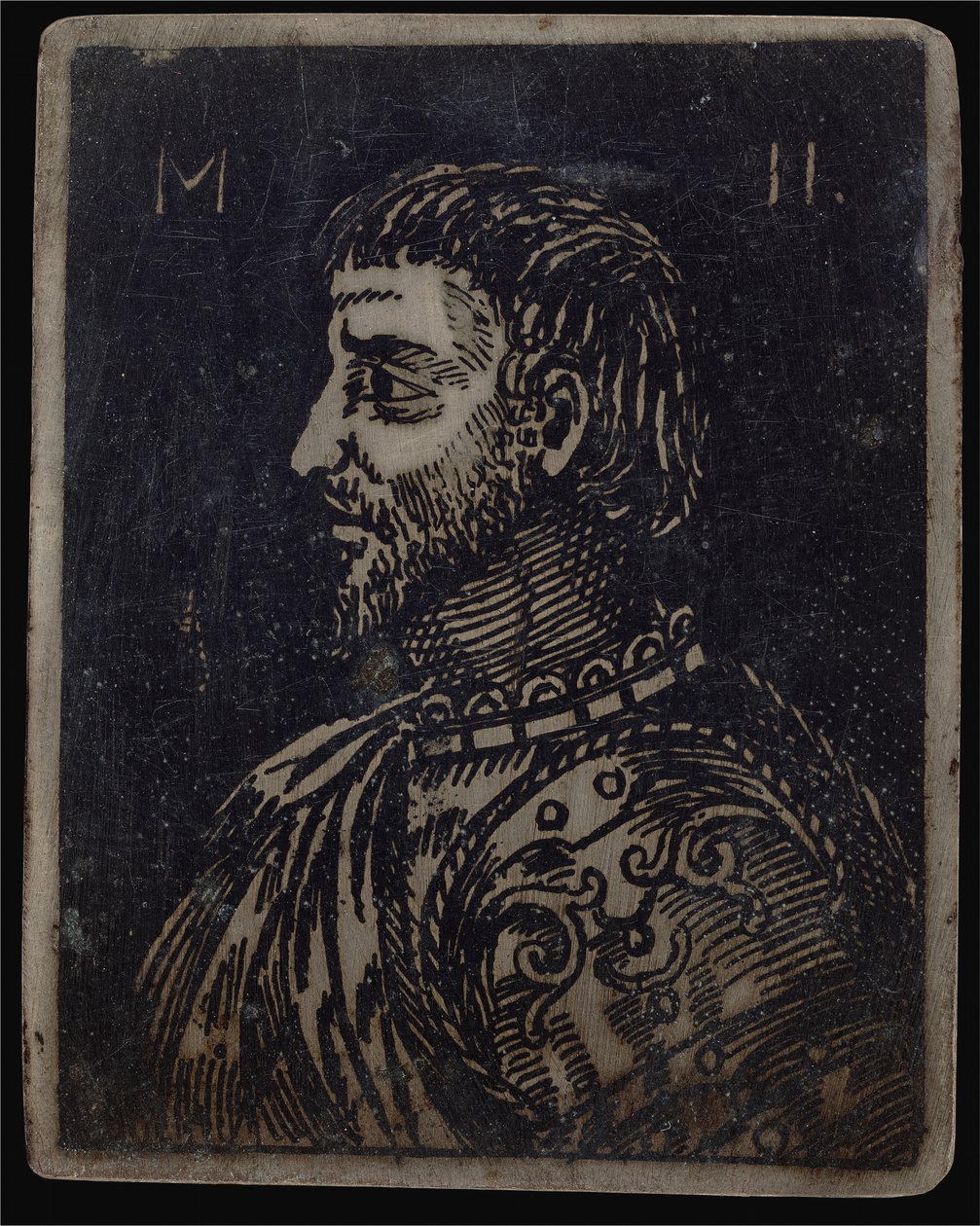 Busta vousatého muže se zdobeným prsním plátem směřujícím doleva od Italian 16th Century
