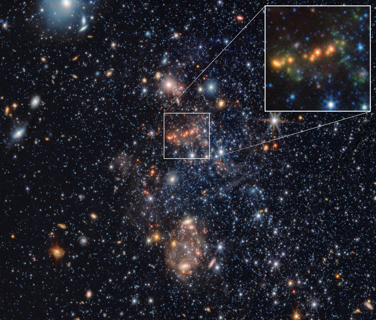 Výřez oblasti PAH v souhvězdí Sextans A (snímky z kamer NIRCam a MIRI) od James Webb Space Telescope (NASA)