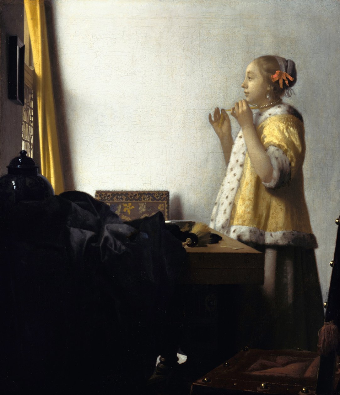 Mladá žena s perlovým náhrdelníkem od Jan Vermeer van Delft
