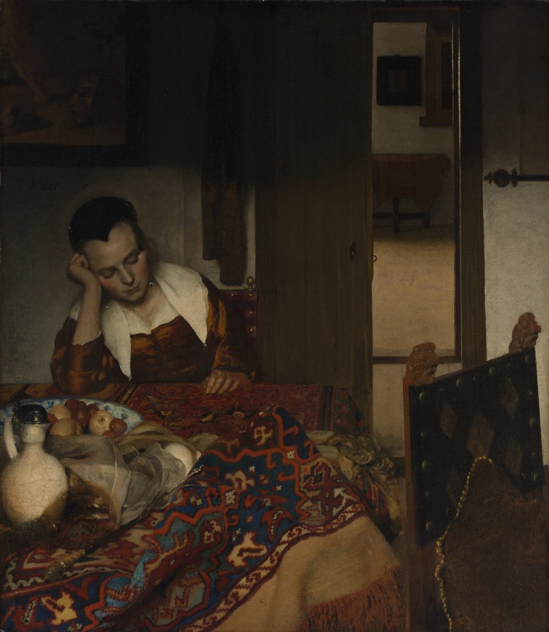 Dívka spí u stolu od Johannes Vermeer