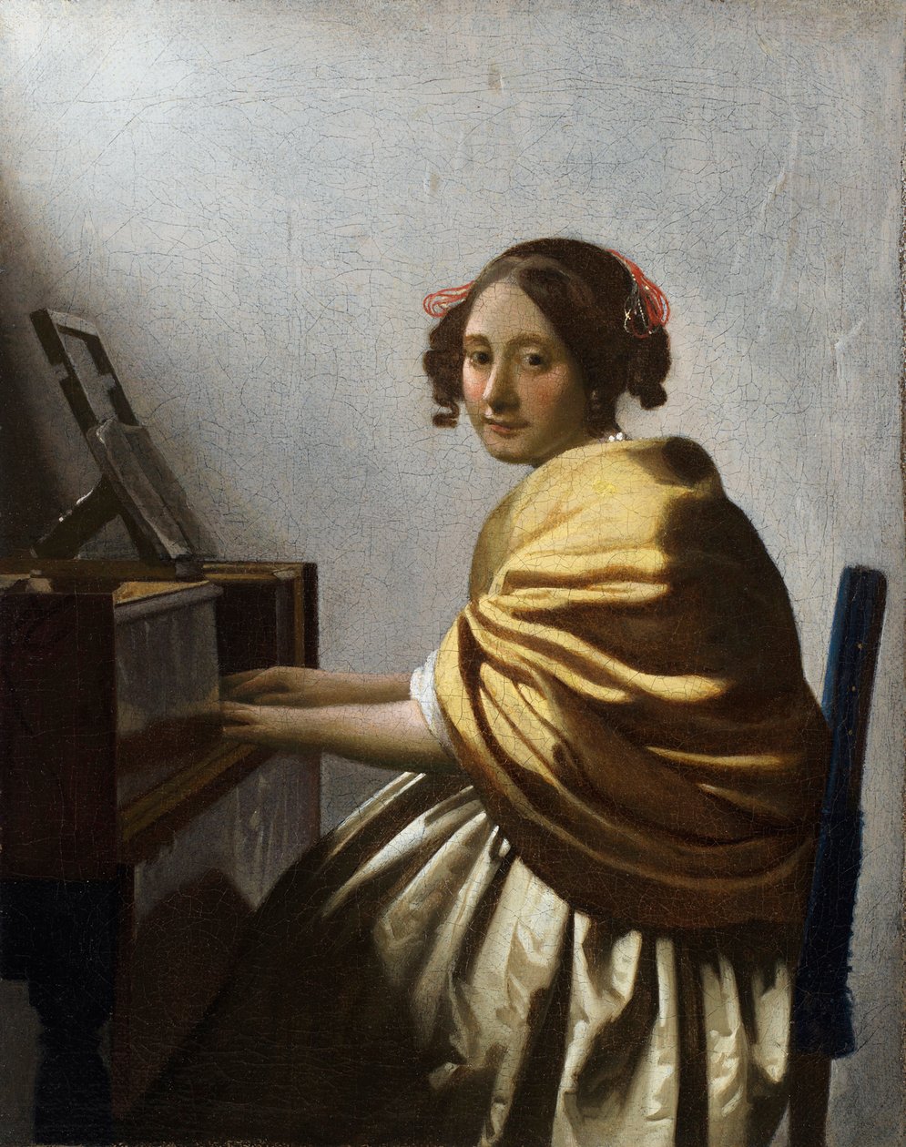 ""Mladá žena sedící u panenské"" (Mladá žena sedící u panenské) Obraz Jana Vermeera (Johannes) (1632-1675) cca 1670 Rozměr 25,1x20 cm Soukromá sbírka od Johannes Vermeer