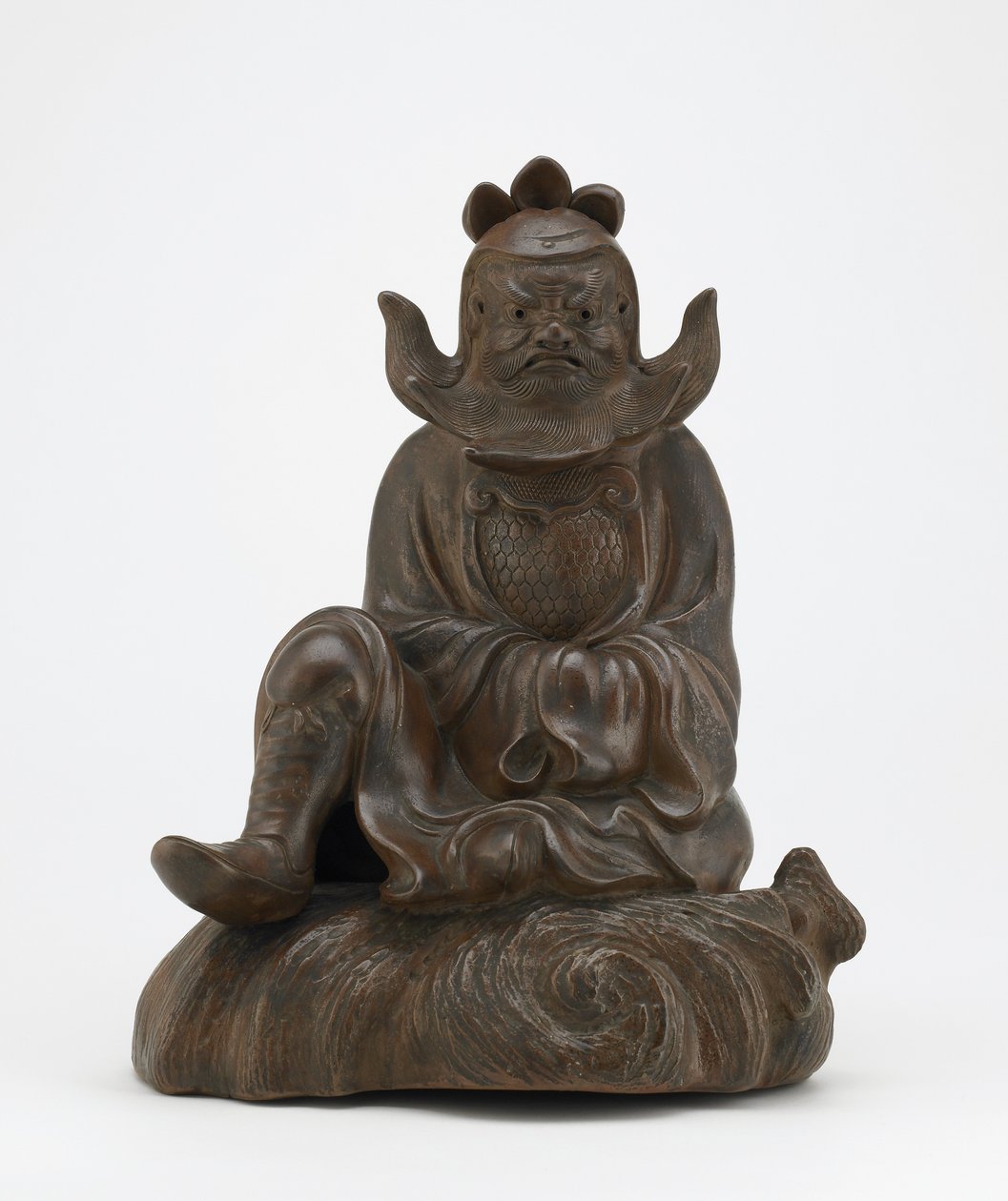 Postava Shokiho, tlumiče démonů, sedícího na skále, Imbe, prefektura Okayama, období Edo nebo éra Meidži (keramika) od Japanese School