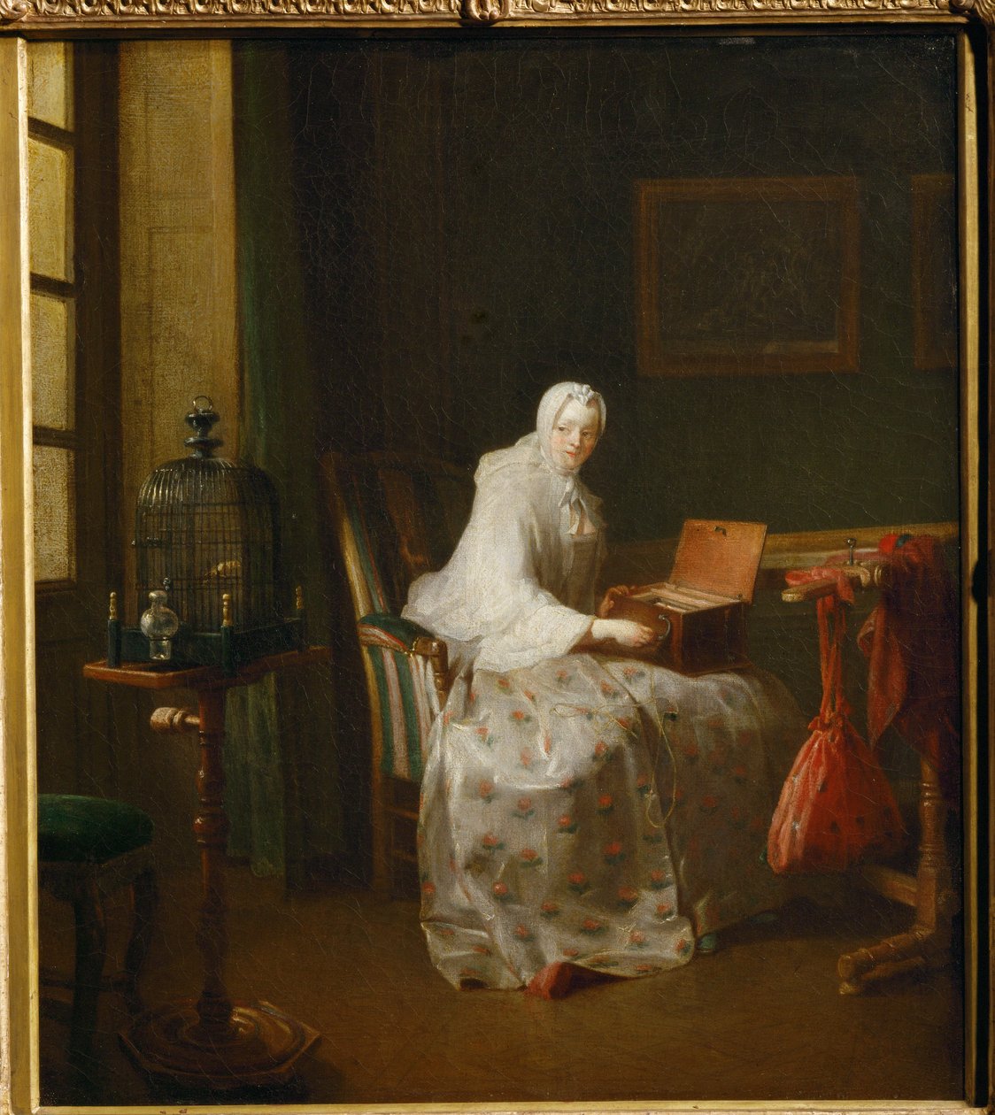 La serinette, dit aussi Dame variant ses amusements - serinette je malý mechanický nástroj, který se používá k učení ptáků zpívat ... od Jean Baptiste Simeon Chardin