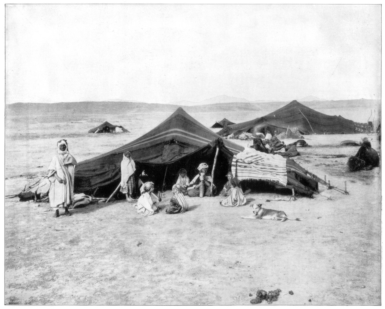 Karavanní tábor, poušť Sahara, konec 19. století od John L. Stoddard
