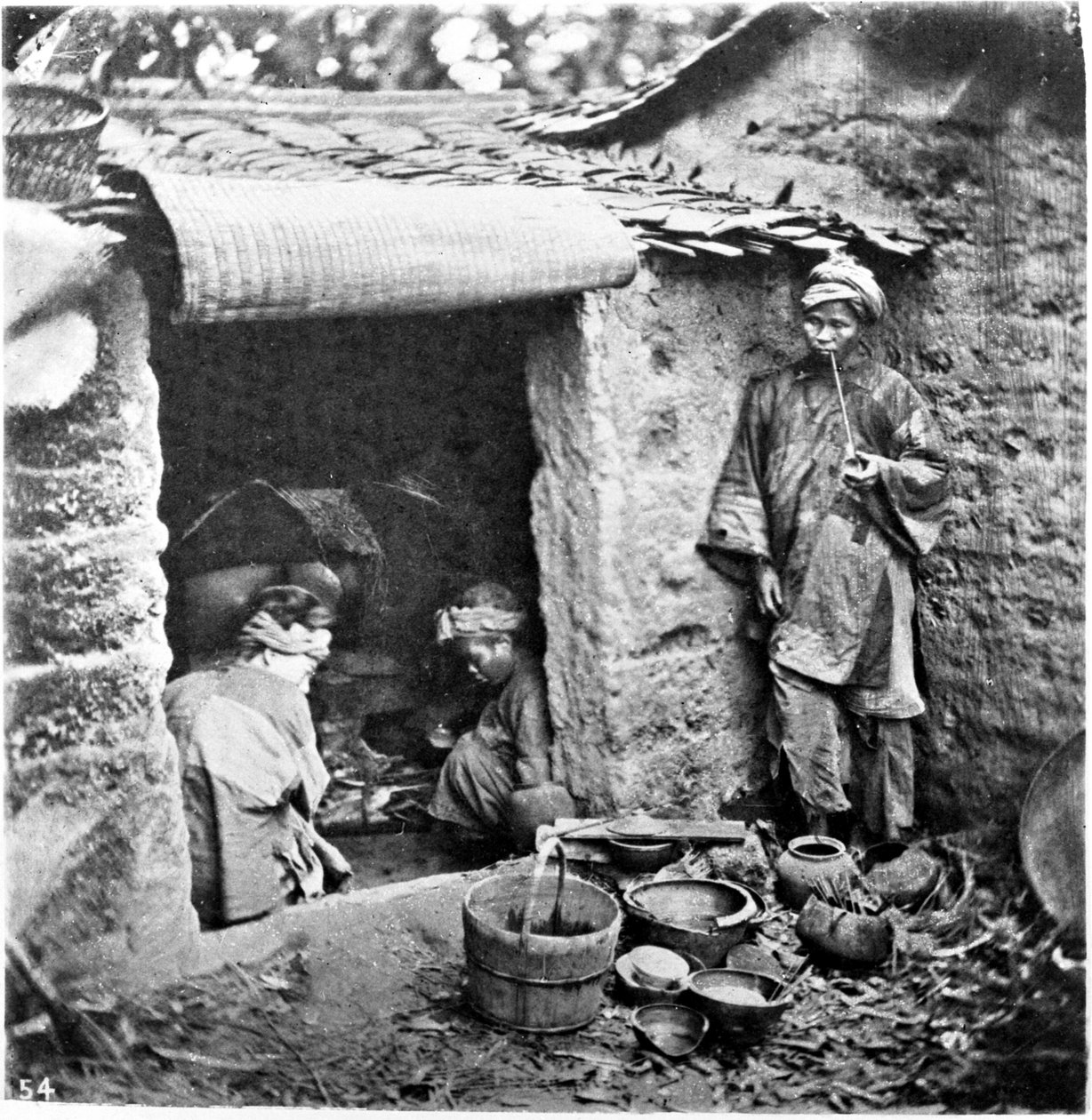 Čína, jednoduchá rodina, kolem roku 1870 (foto) od John Thomson