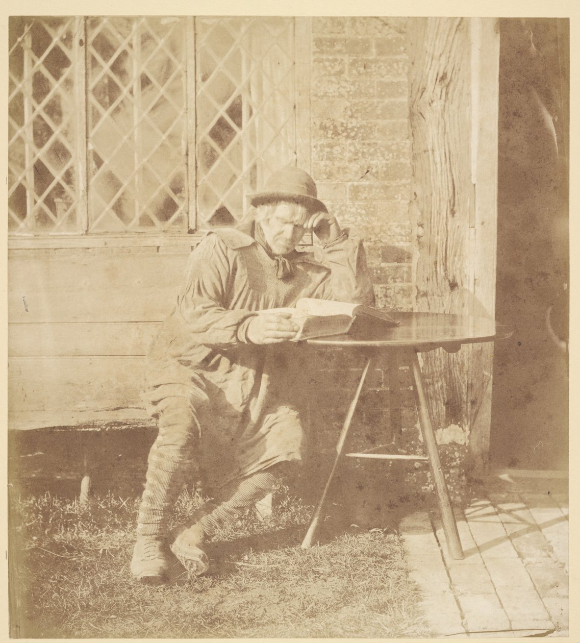 [Muž čtoucí knihu] od John Whistler