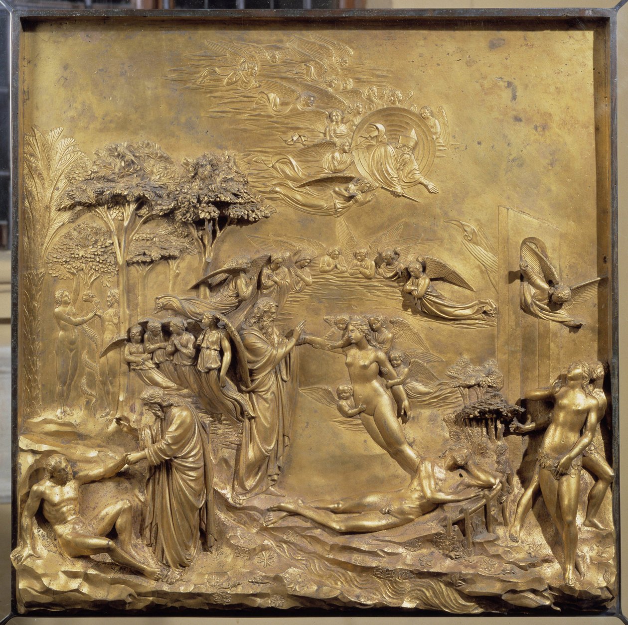 Historie Adamova života: narození Adama, stvoření Evy a Adam a Eva loví z ráje. Původní panel dveří ráje od Lorenzo Ghiberti