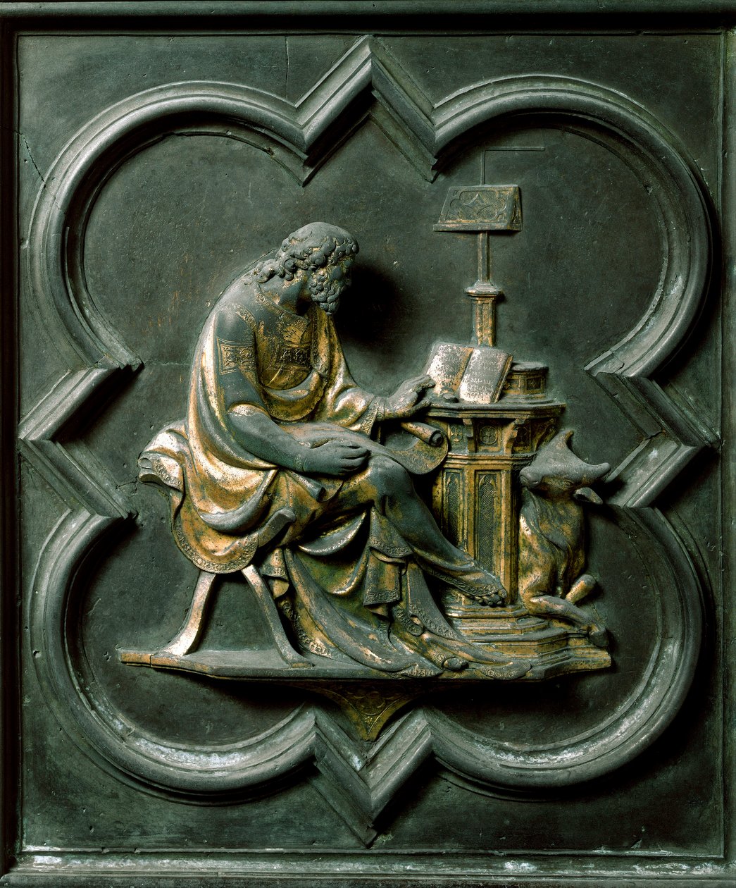 Severní brána (nazývaná Křížová brána, na sever), vnější detail: evangelista svatého Lukáše. Bronzová socha od Lorenza Ghibertiho (1378-1455) od Lorenzo Ghiberti