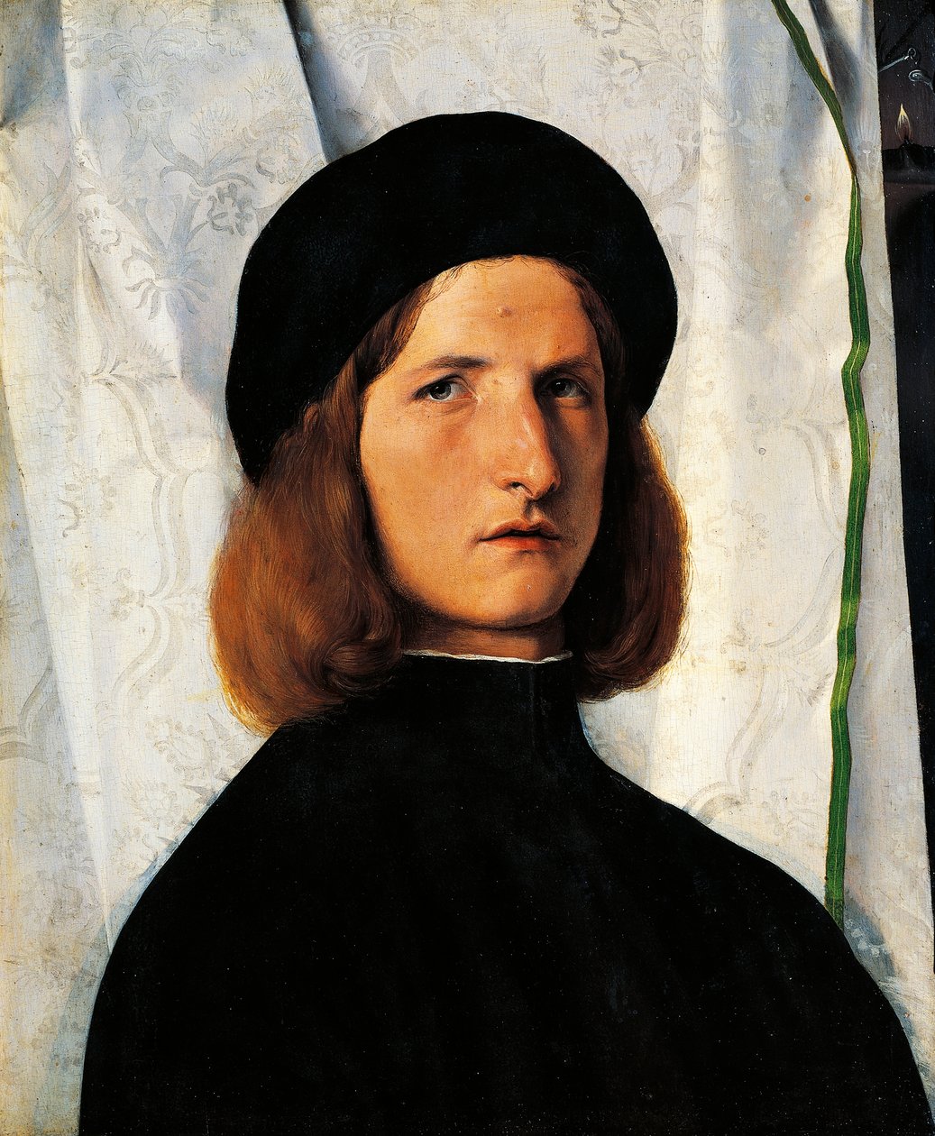 Portrét mladého muže s lampou od Lorenzo Lotto