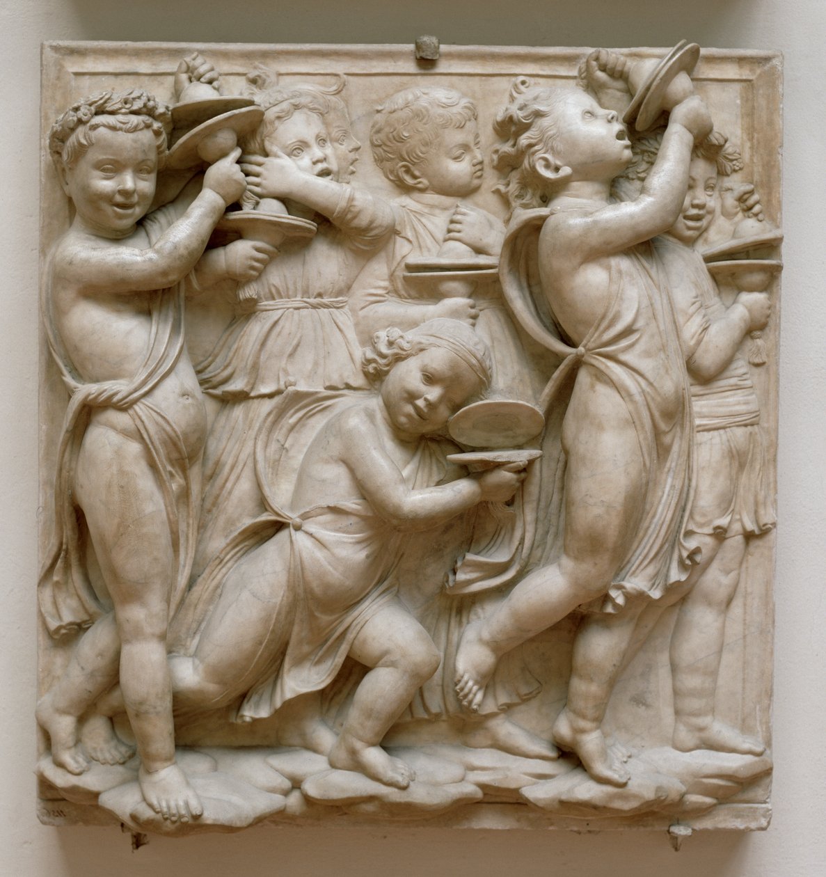 Putti hrající na činely, detail z Cantoria, kolem 1432-38 (mramor) od Luca Della Robbia