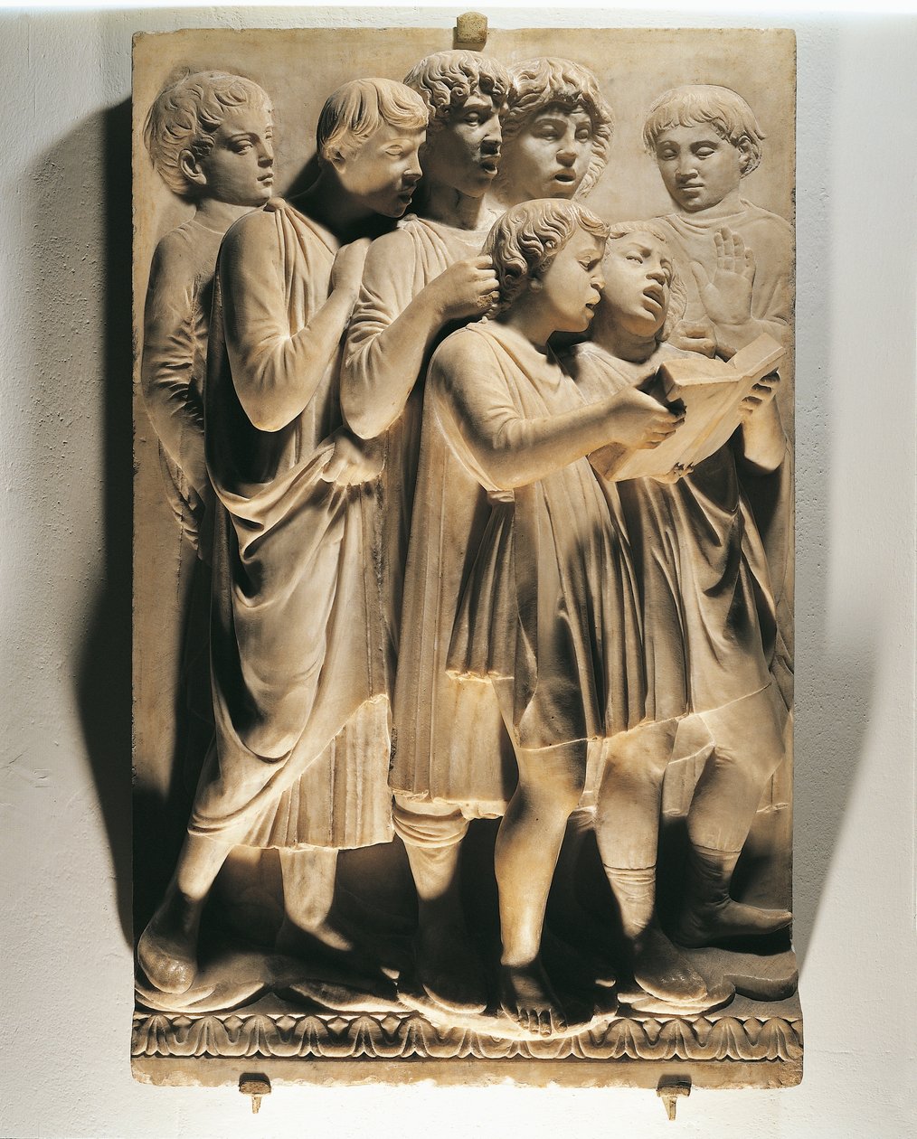 Chvalte ho ve sboru (Salmo 150, Chvalte Pána), panel se zpívajícími dětmi od Luca Della Robbia
