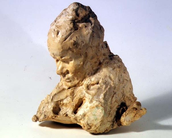 Hlava muže (vosk na sádře) od Medardo Rosso