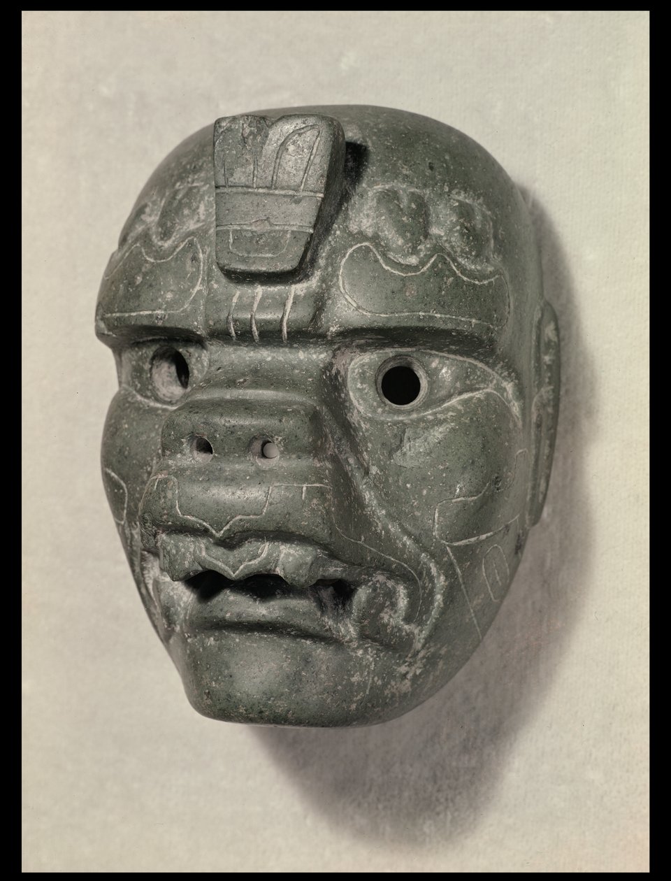 Kočičí maska muže, z Oaxaca, Pre-Columbian (nefrit) od Mexican School