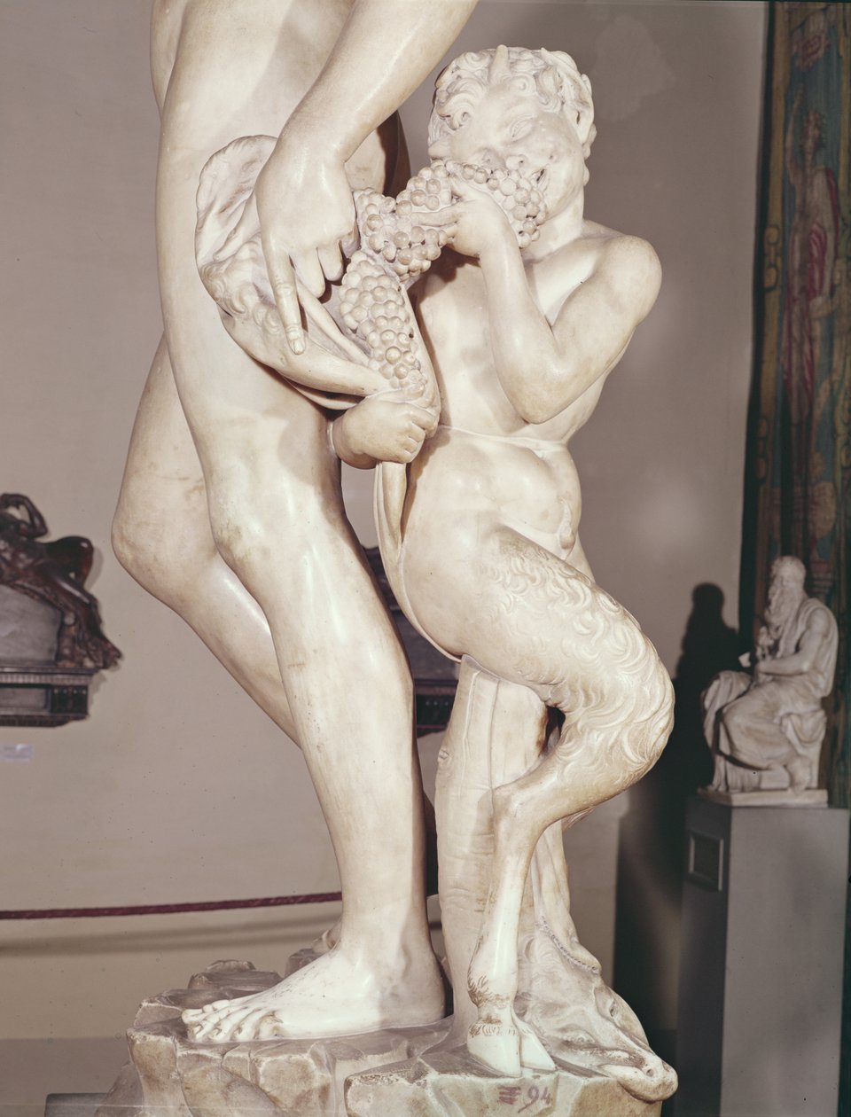 Bakchus s mladým faunem detail mladého fauna, mramor 1496-7 od Michelangelo Buonarroti