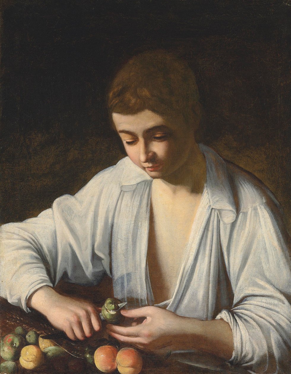 Chlapec loupání ovoce od Michelangelo Merisi Caravaggio