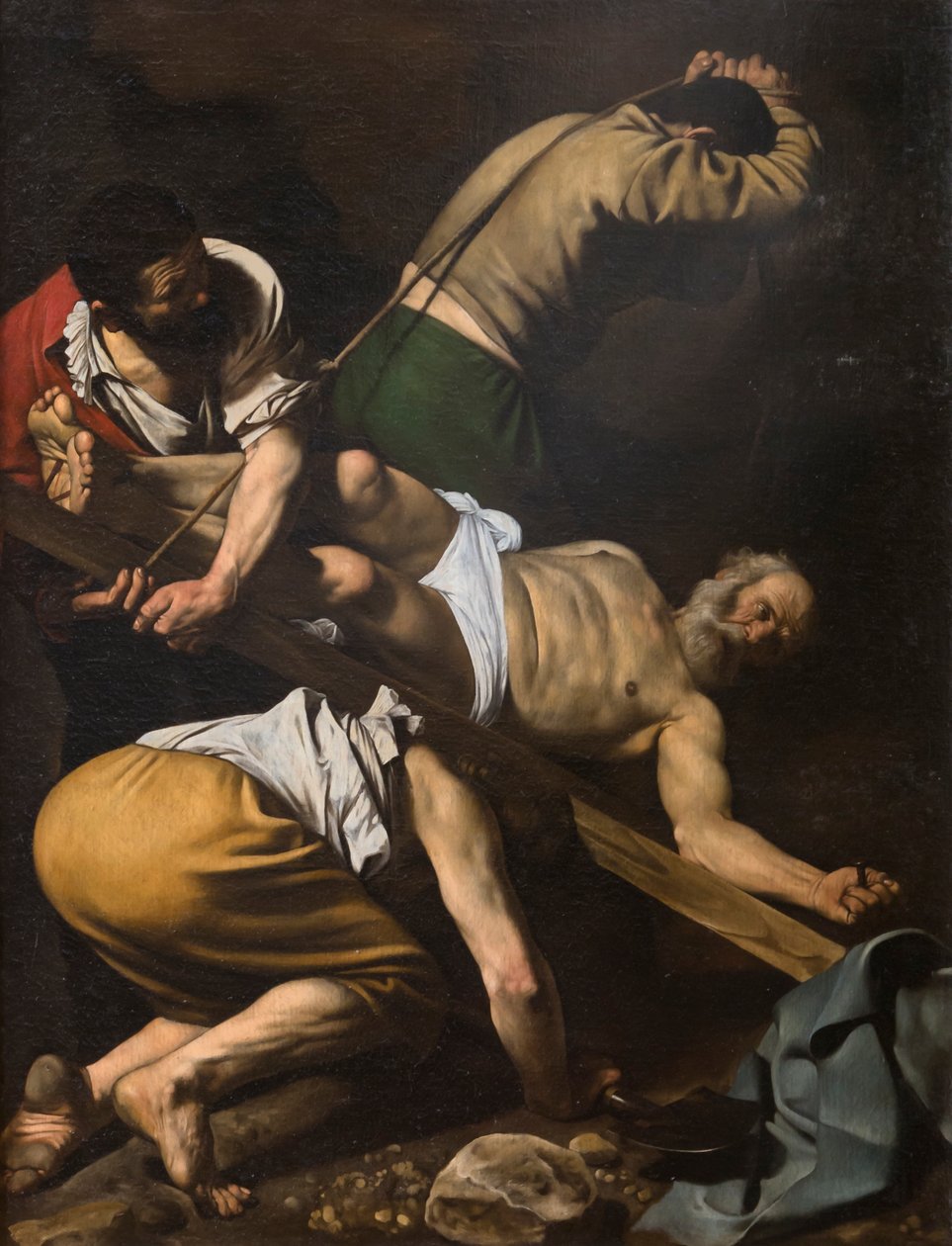 Ukřižování svatého Petra od Michelangelo Merisi da Caravaggio