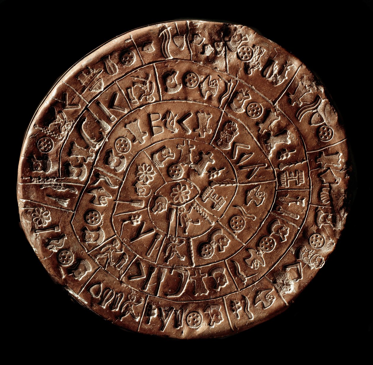 Disk Phaistos (Phaistos Disk, Phaestos Disc) (Minojské umění - 1700 - 1600 př.nl) pokrytý hieroglyfy. od Minoan