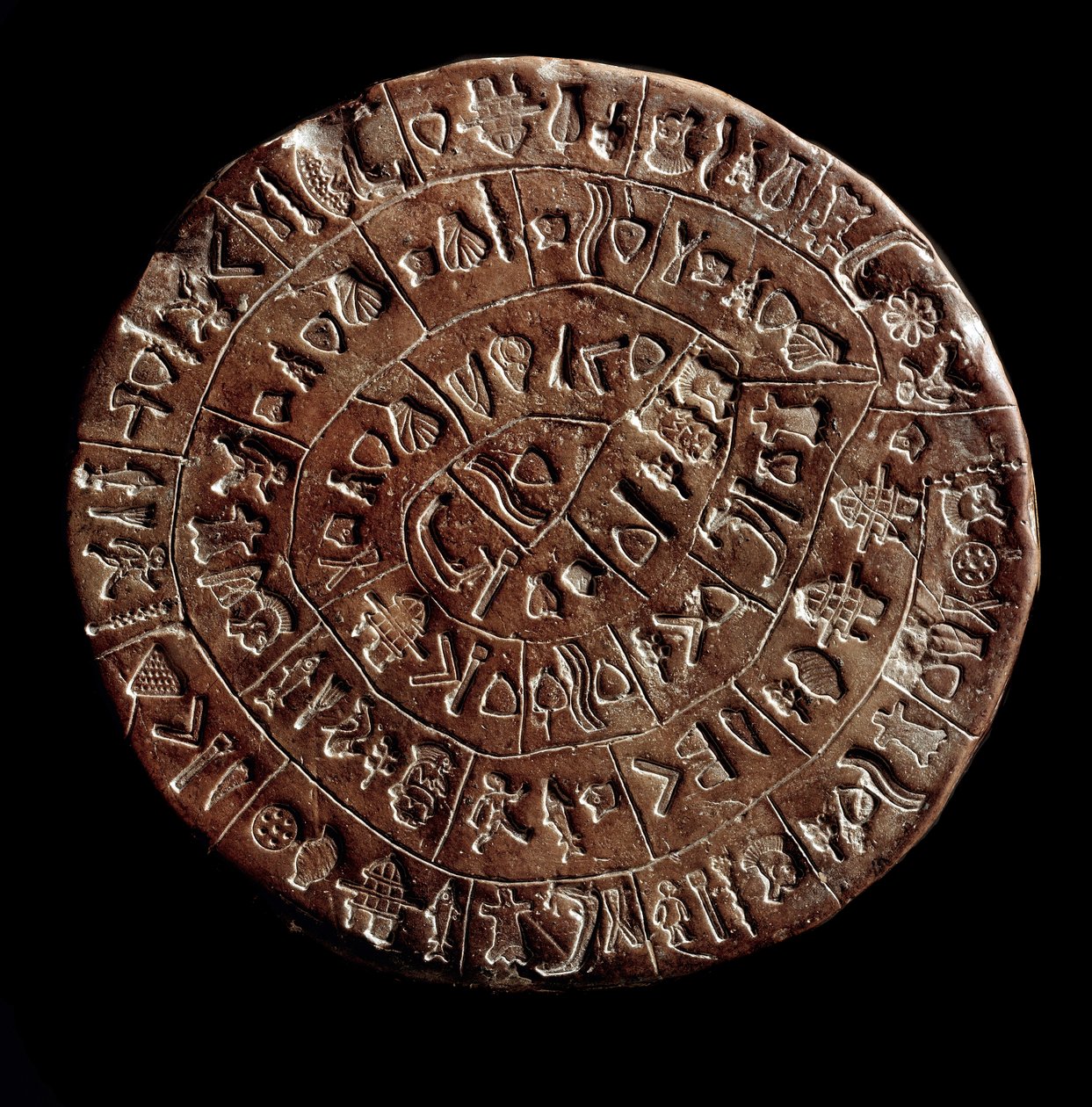 Disk Phaistos (Phaistos Disk, Phaestos Disc) (Minojské umění - 1700 - 1600 př.nl) pokrytý hieroglyfy. od Minoan