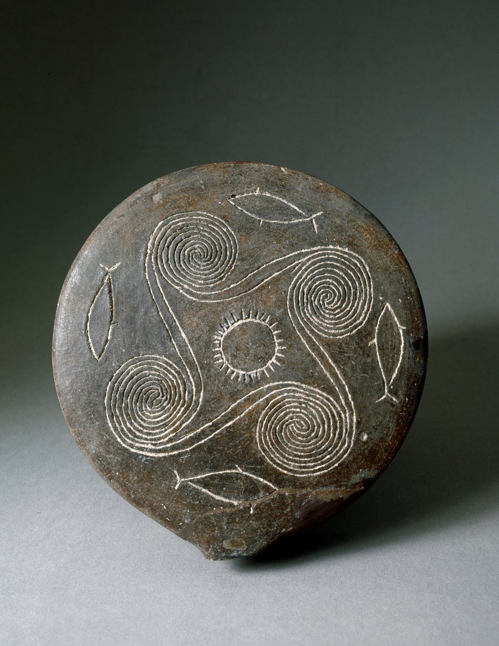 Minojské umění: kruhový disk Naxos v terakotě. Minojská civilizace. 2400-2000 před naším letopočtem. Athény, Národní archeologické muzeum od Minoan