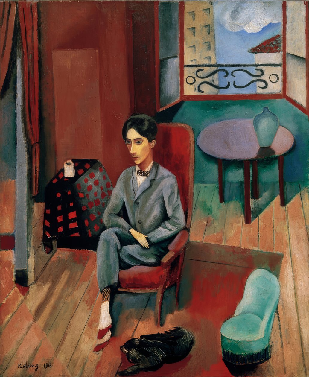 Jean Cocteau sedí ve svém ateliéru od Moise Kisling