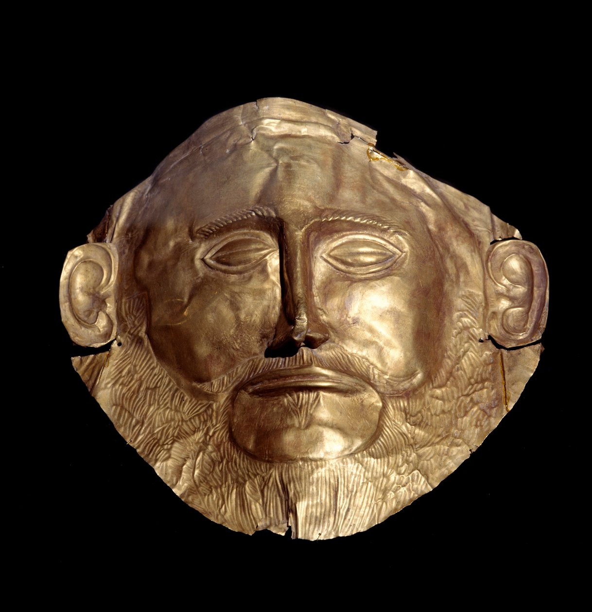 Pohřební maska z mykénského zlata (z Mykénů) známá jako „Agamemnonova maska““ od Mycenaean