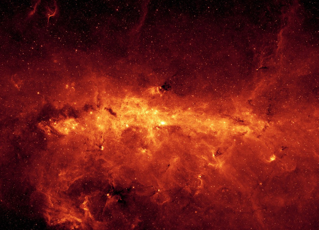 Střed galaxie Mléčná dráha pozorovaný Spitzerovým vesmírným dalekohledem. Infračervený snímek galaktického středu a prachových mračen, osvětlených mladými hmotnými hvězdami. Poděkujte NASA. Věda Astronomie Vesmír od National Aeronautics and Space Administration National Aeronautics and Space Administration