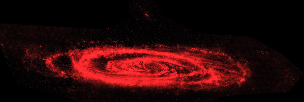 Infračervené kompozitní snímky Spitzerova vesmírného dalekohledu zobrazují galaxii Andromeda. Hlavní snímek zdůrazňuje kontrast mezi rozbouřenými vlnami prachu (červená) v galaxiích a hladkým mořem starších hvězd. Poděkujte NASA od National Aeronautics and Space Administration National Aeronautics and Space Administration