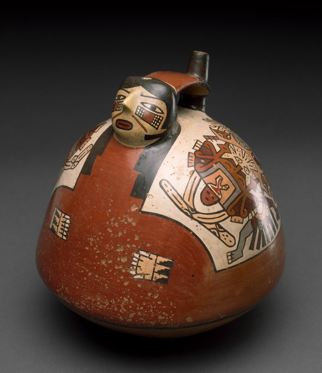 Nádoba v podobě ženy v čepici, Peru, 300-600 (hliněné nádobí s polychromovanou malbou) od Nazca Culture