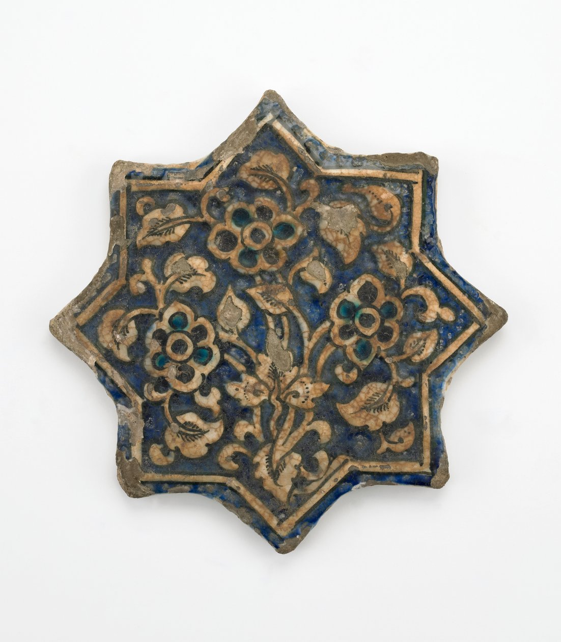 Dlaždice ve tvaru osmicípé hvězdy, období Il-Khanid, 1256-1335 (kamenná pasta, lisovaná a malovaná pod průhlednou glazurou) od Persian School