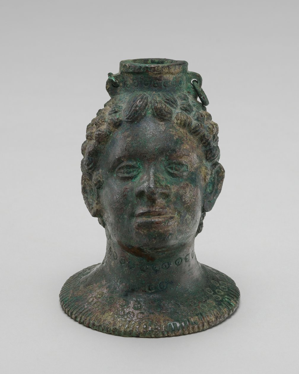 Kontejner v podobě africké hlavy od Probably Etruscan