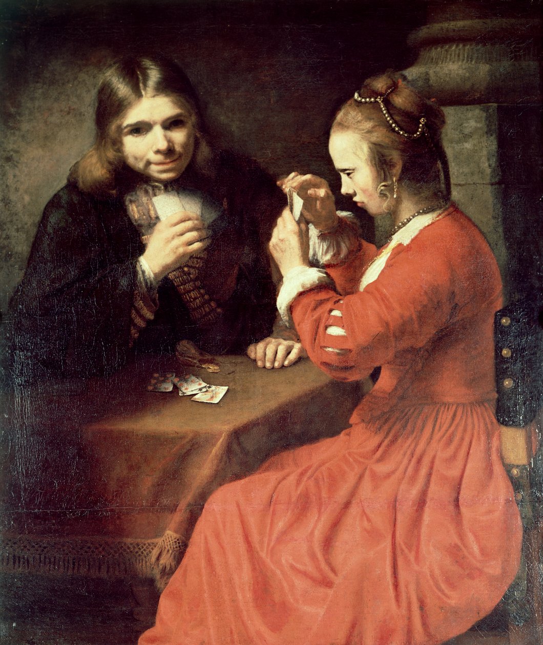 Mladý muž a dívka hrají karty od Rembrandt van Rijn