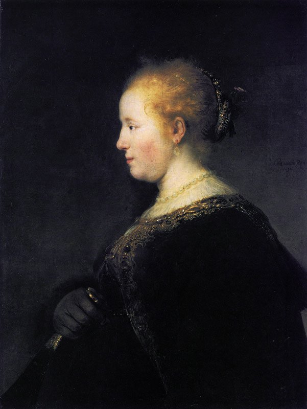 Mladá žena v profilu s fanouškem od Rembrandt van Rijn