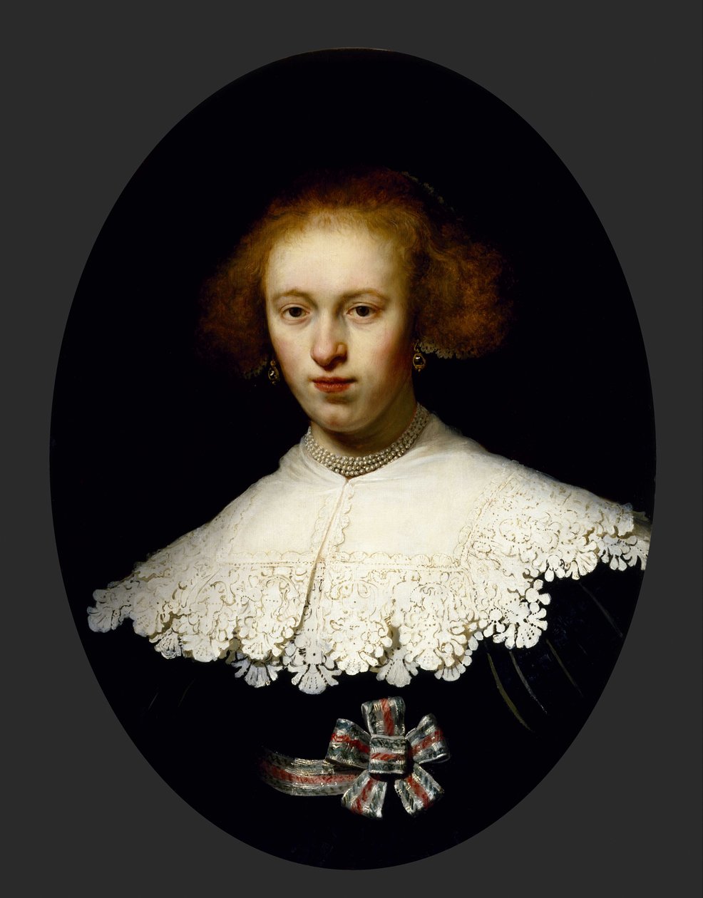 Portrét mladé ženy od Rembrandt van Rijn