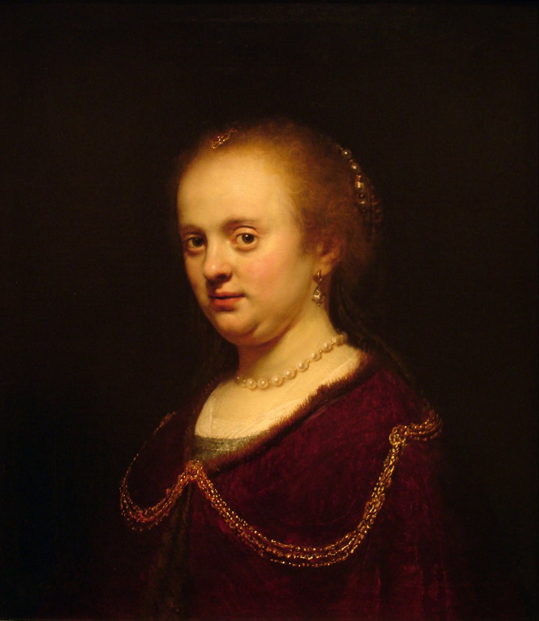 Portrét mladé ženy od Rembrandt van Rijn