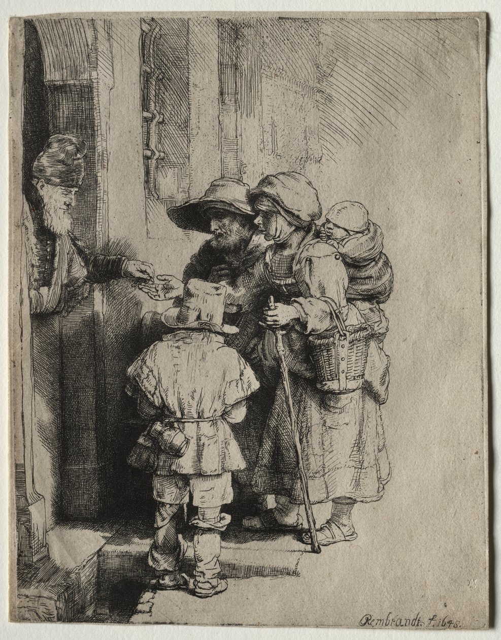 Žebráci přijímající almužnu u dveří domu od Rembrandt van Rijn