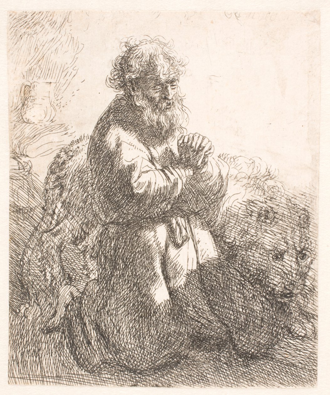 Svatý Jeroným klečí v modlitbě a dívá se dolů od Rembrandt van Rijn