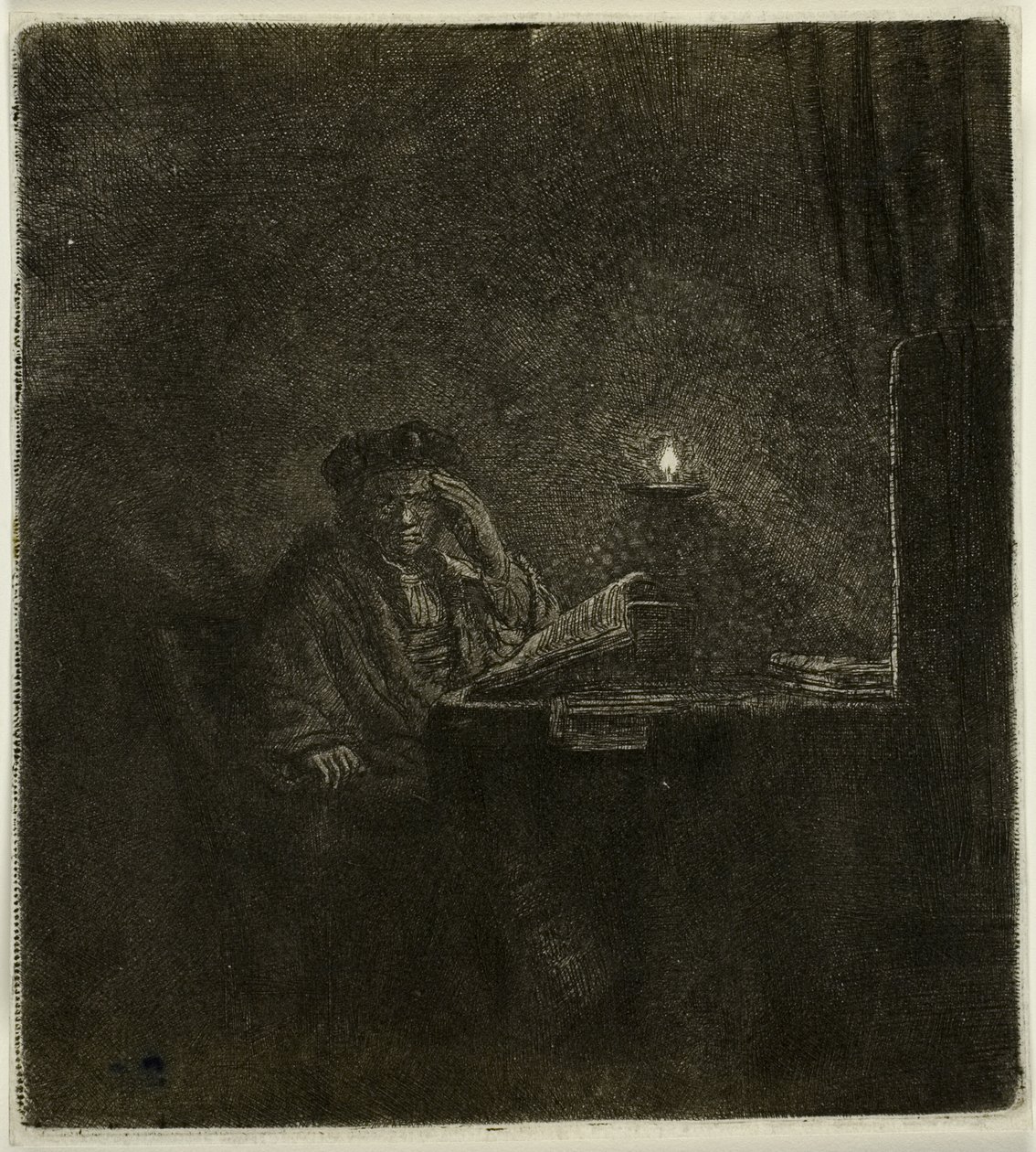 Student u stolu při svíčkách od Rembrandt van Rijn
